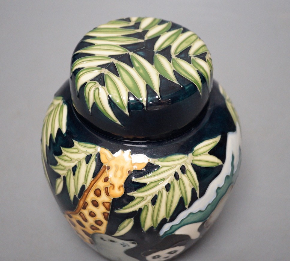 A Moorcroft pottery Noah’s Ark lidded ginger jar, base monogrammed JK and marked ‘M.C.C 530’, 15cm